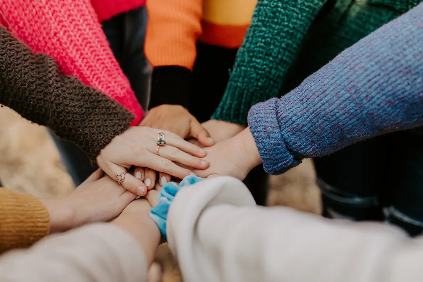 Hands coming together as a team